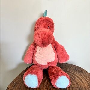 Cuddly Red Dinosaur Plush Toy with Blue Accents